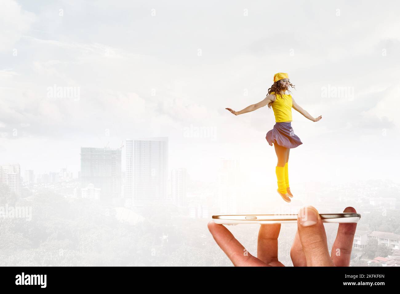 Young woman jumping in the air Stock Photo