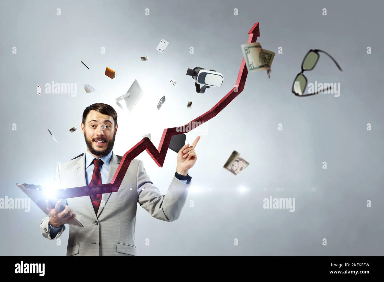 Young businessman and red arrow Stock Photo