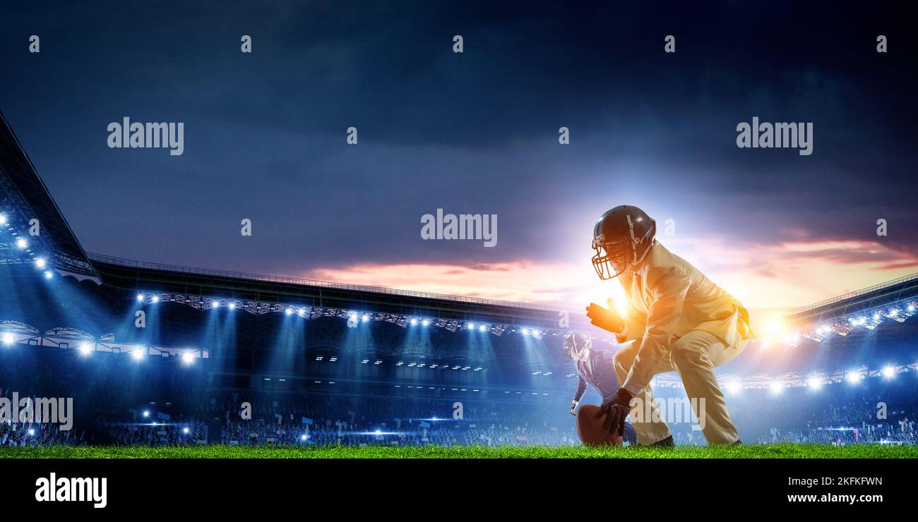 Businessman acting as american football players Stock Photo