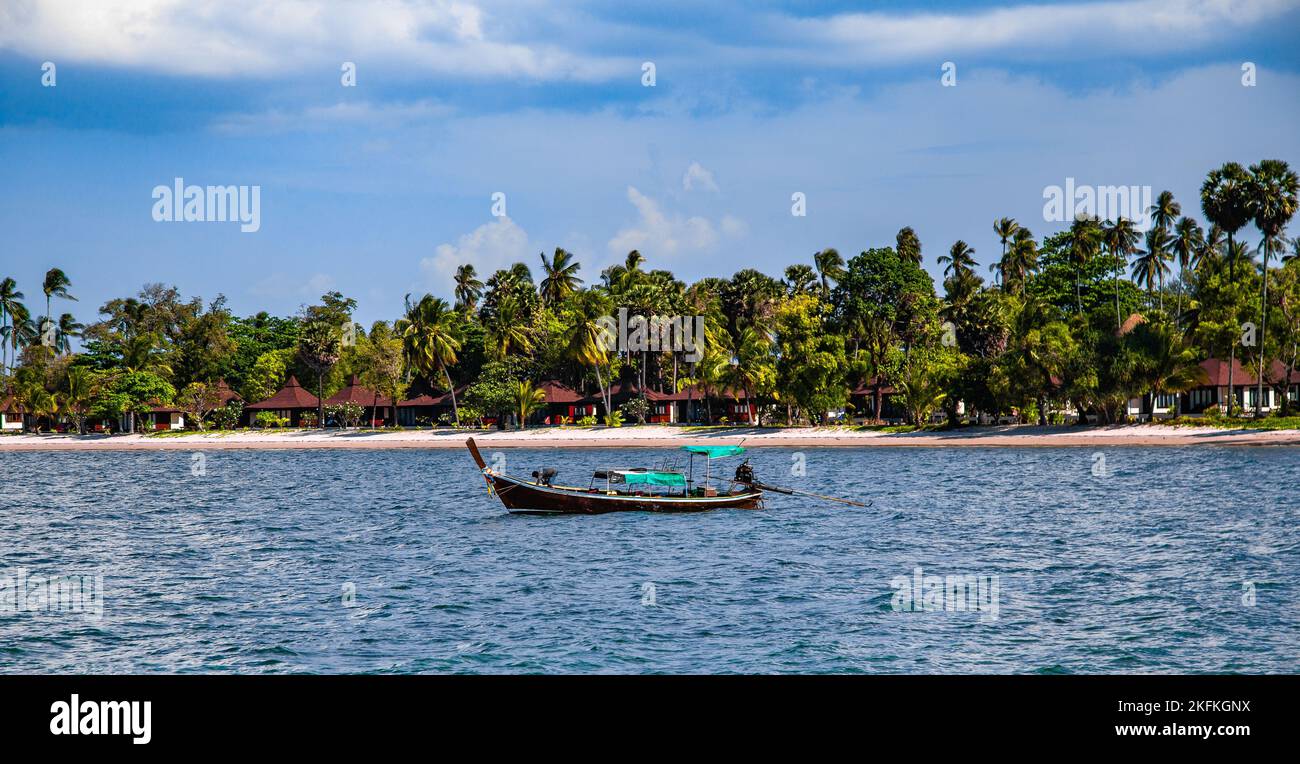 Beach view with long tail boats in koh Mook or koh Muk island, in Trang