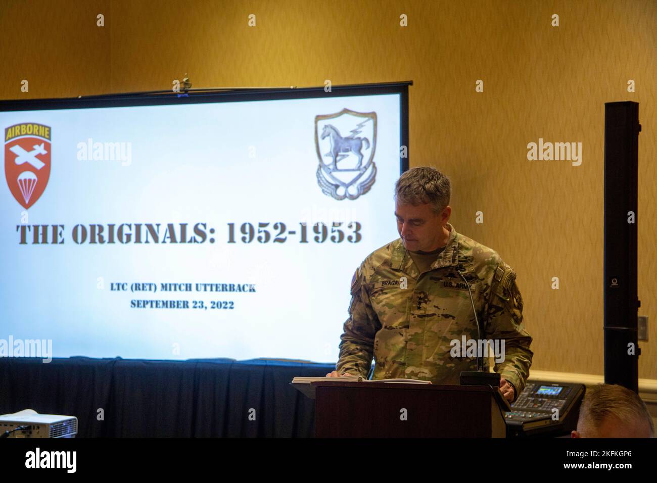 Lieutenant General Braga gives a speech before introducing four of the original 10th Special