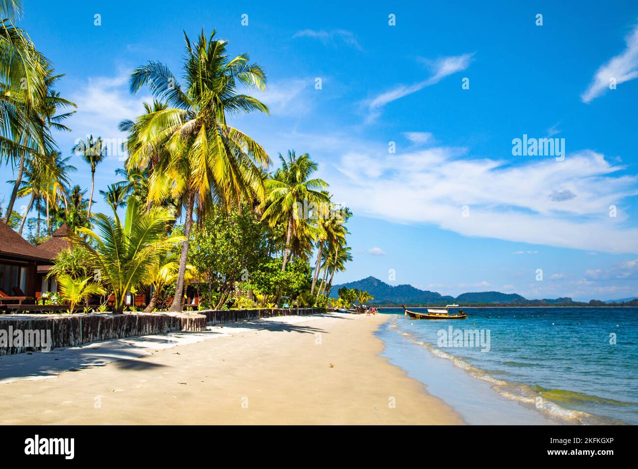 Beach view with long tail boats in koh Mook or koh Muk island, in Trang