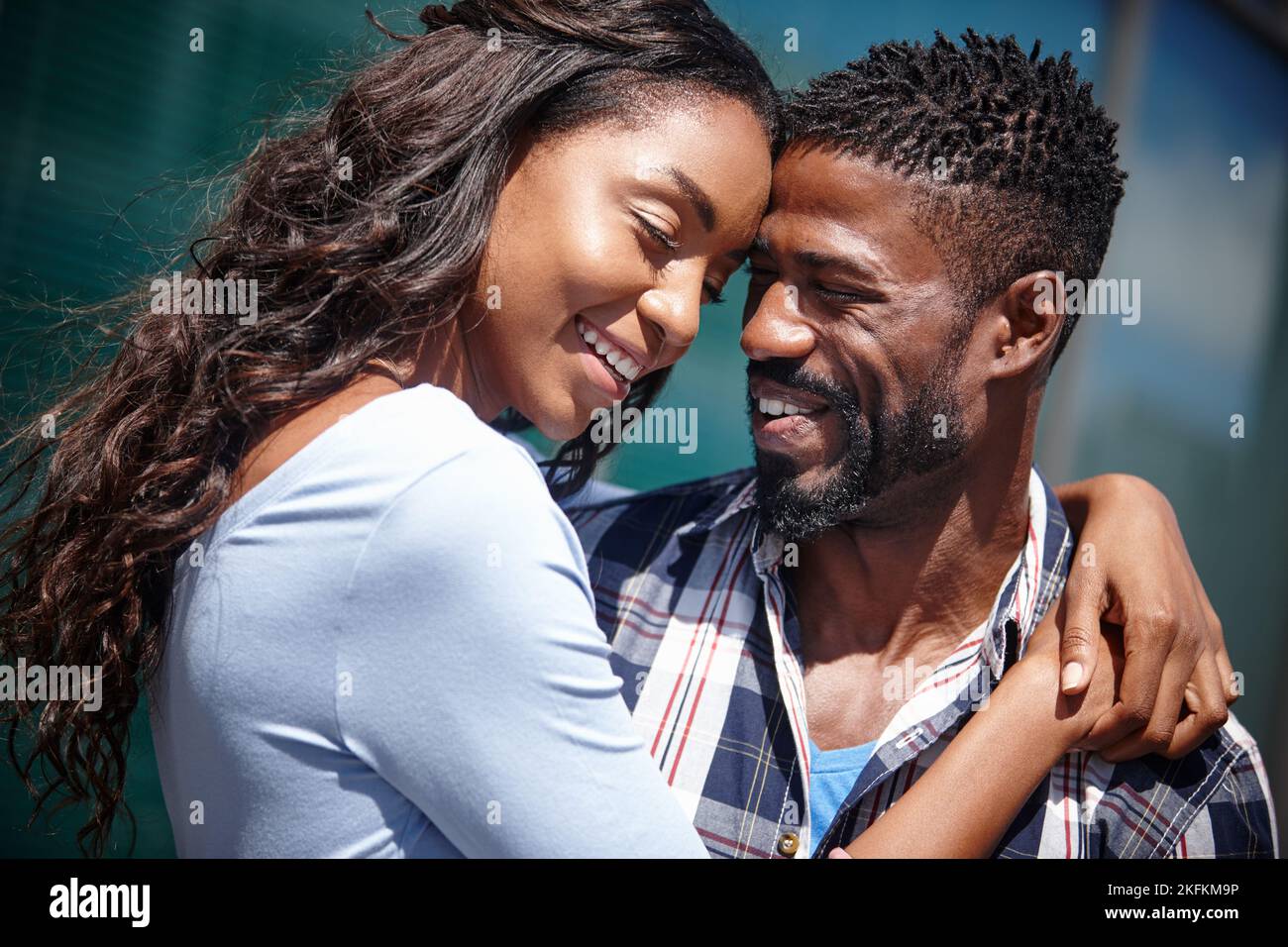 You are my happy place. an affectionate couple spending time outdoors