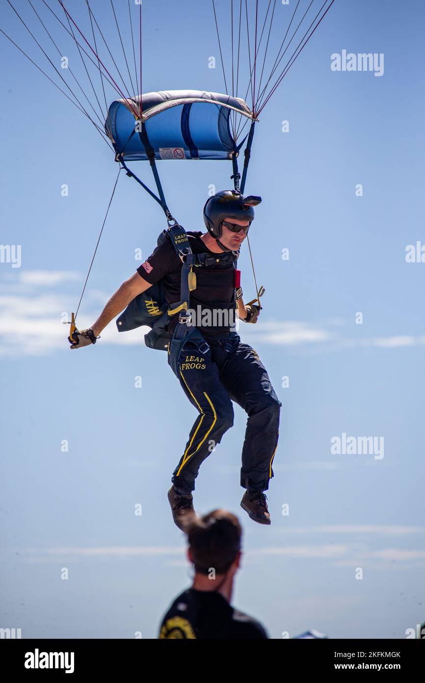 The U.S. Army Parachute Team, nicknamed the Golden Knights, and U.S. Navy Parachute Team, nicknamed the Leap Frogs, conduct an aerial demonstration at the 2022 Marine Corps Air Station Miramar Air Show at MCAS Miramar, California, Sept. 24, 2022. The theme for the 2022 MCAS Miramar Air Show, “Marines Fight, Evolve and Win,” reflects the Marine Corps’ ongoing modernization efforts to prepare for future conflicts. Stock Photo