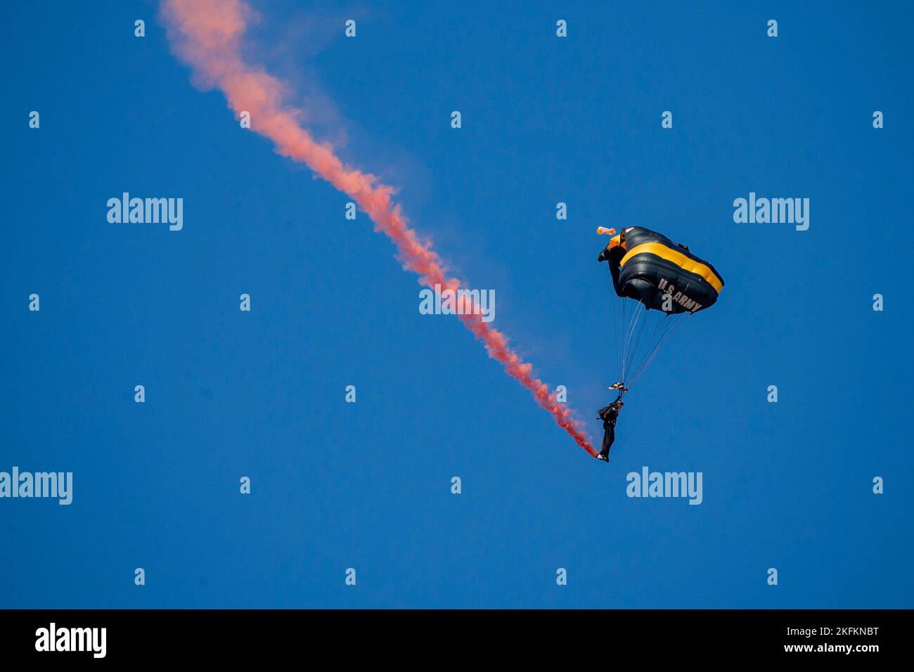 The U.S. Army Parachute Team, nicknamed the Golden Knights, and U.S. Navy Parachute Team, nicknamed the Leap Frogs, conduct an aerial demonstration at the 2022 Marine Corps Air Station Miramar Air Show at MCAS Miramar, California, Sept. 24, 2022. The theme for the 2022 MCAS Miramar Air Show, “Marines Fight, Evolve and Win,” reflects the Marine Corps’ ongoing modernization efforts to prepare for future conflicts. Stock Photo
