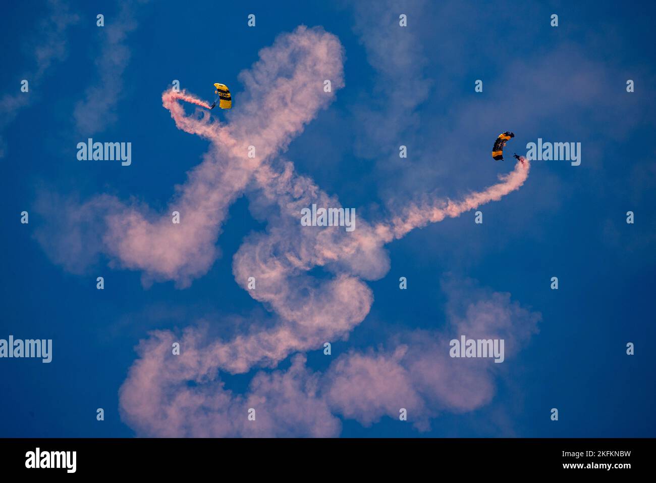 The U.S. Army Parachute Team, nicknamed the Golden Knights, and U.S. Navy Parachute Team, nicknamed the Leap Frogs, conduct an aerial demonstration at the 2022 Marine Corps Air Station Miramar Air Show at MCAS Miramar, California, Sept. 24, 2022. The theme for the 2022 MCAS Miramar Air Show, “Marines Fight, Evolve and Win,” reflects the Marine Corps’ ongoing modernization efforts to prepare for future conflicts. Stock Photo