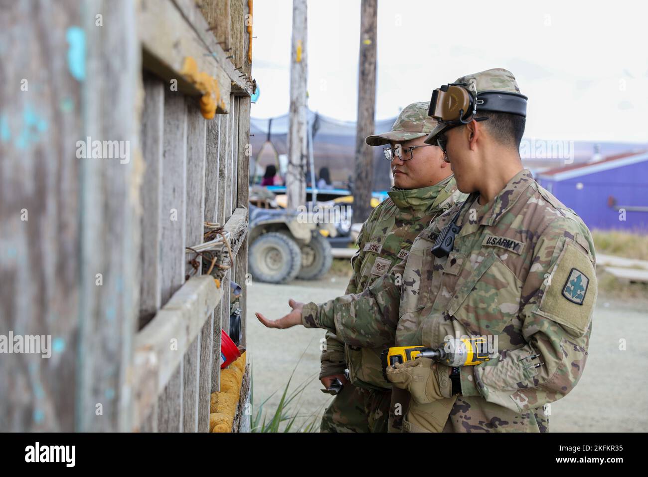 Alaska Army National Guard Spc. Tristan John, right, an infantryman