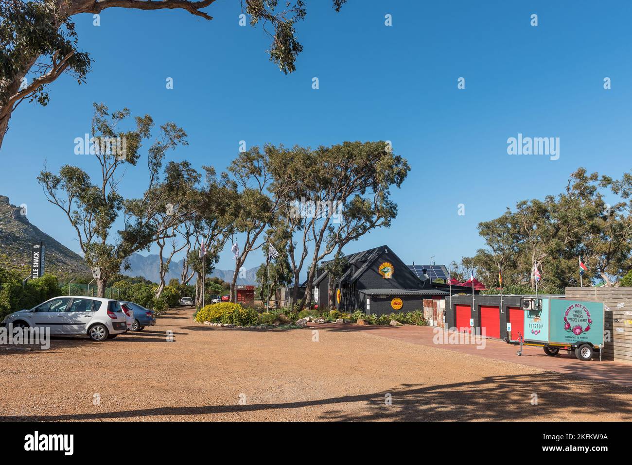 Gordons Bay, South Africa - Sep 20, 2022: The Grille Shack on Clarence Drive near Gordons Bay in the Western Cape Province. Vehicles are visible Stock Photo