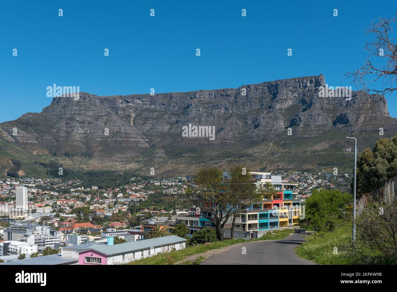 Cape Town, South Africa - Sep 14, 2022: Table Mountain, part of Cape Town and part of the colorful Bo-Kaap as seen from Military Road Stock Photo