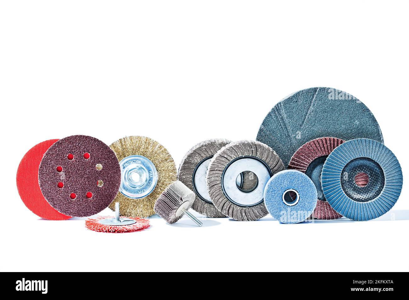big set of rotary abrasive wheels construction tools isolated on white
