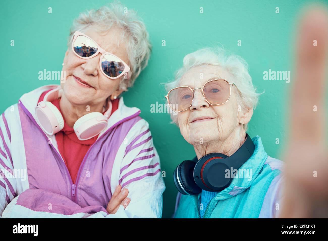  Senior women, fashion and retro selfie with sunglasses, headphones and ...