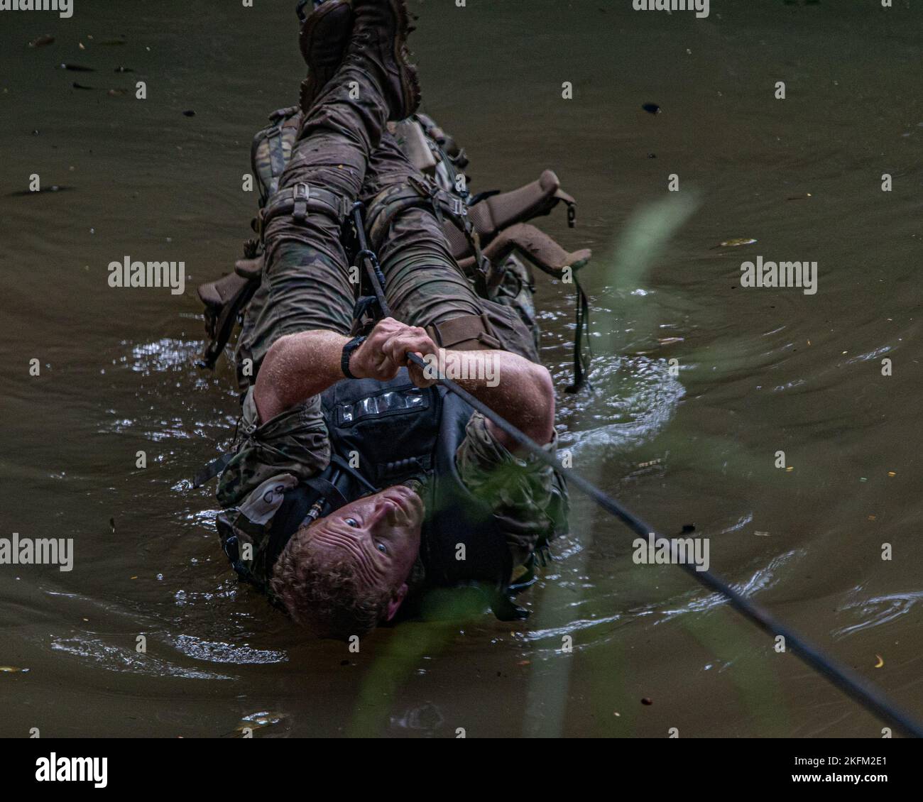 One Rope Bridge With Ruck U.S. Army Soldiers participating in Jungle School perform waterborne ...