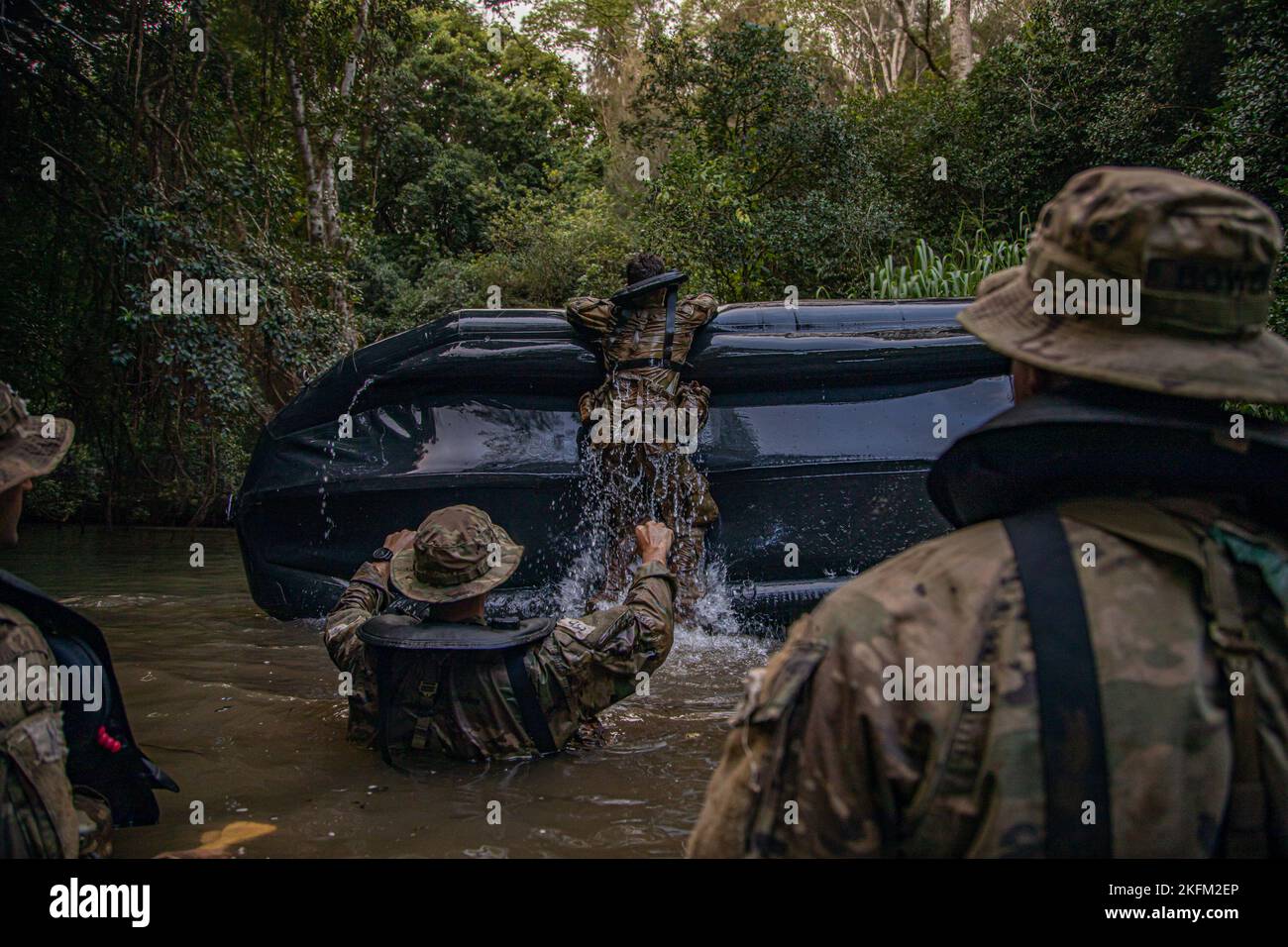 One Rope Bridge With Ruck U.S. Army Soldiers participating in Jungle School perform waterborne ...