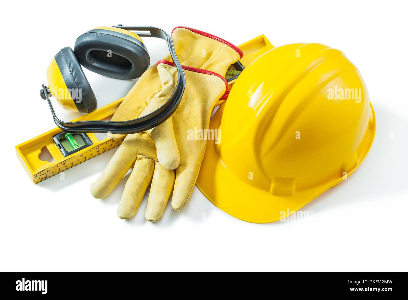 construction working tools helmet gloves level earphones isolated on white background Stock Photo