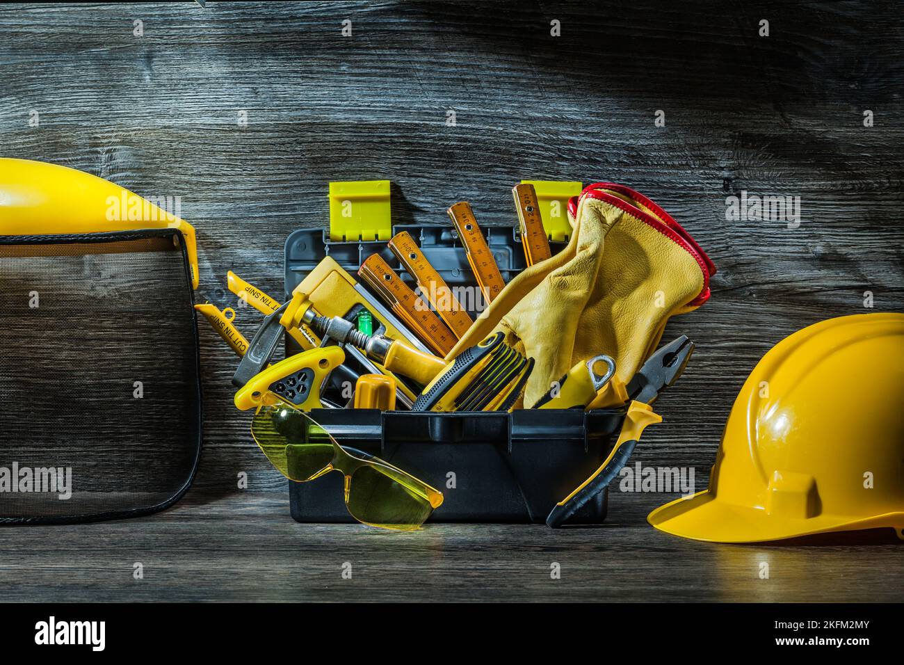 construction tools in little tollbox on table Stock Photo