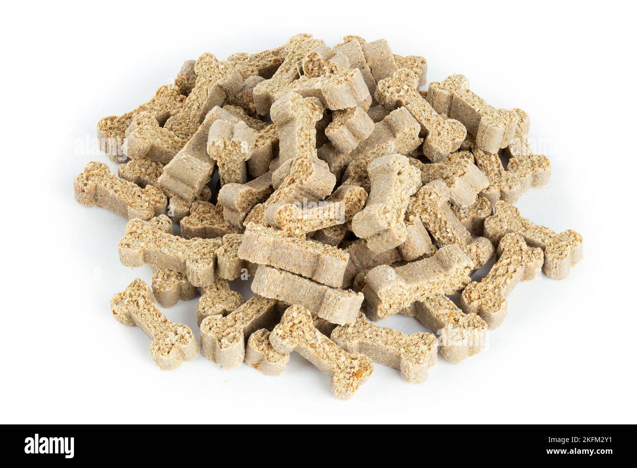 Dry dog food in a pile isolated on white background. Full depth of