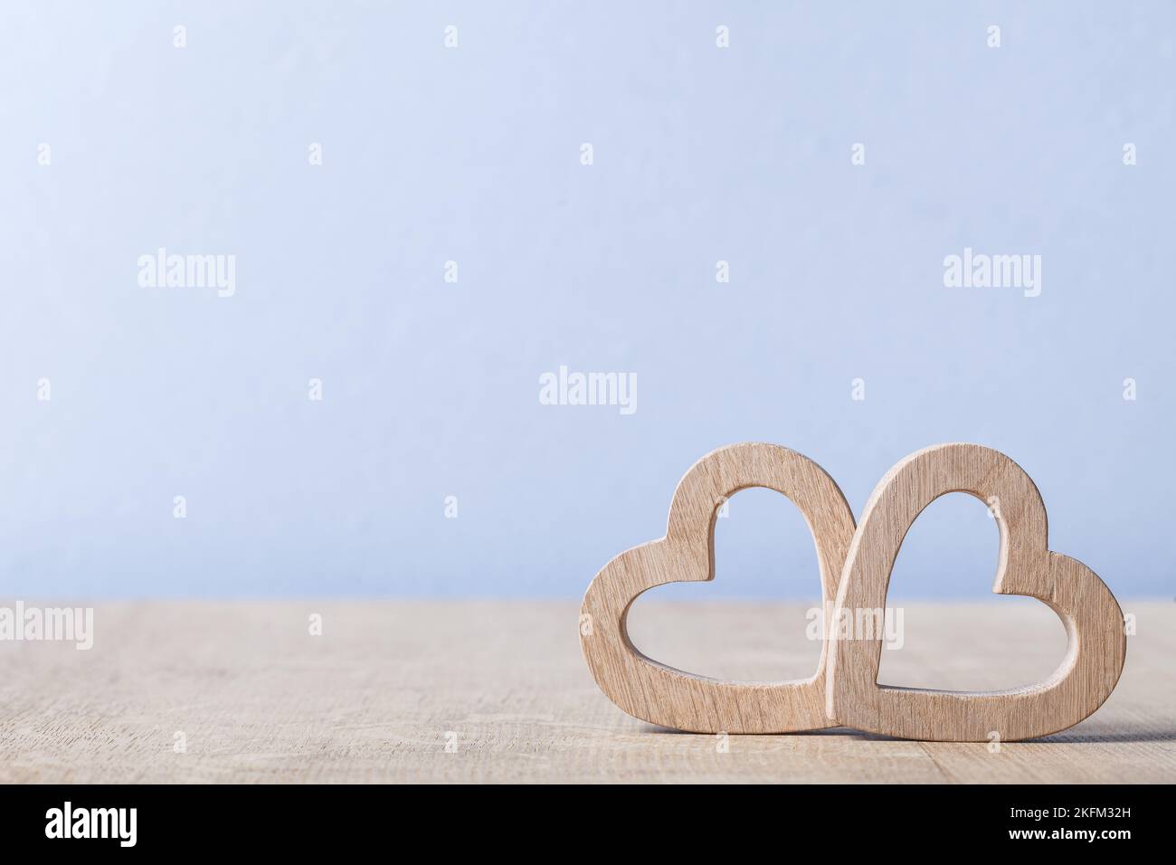 copyspace view two wood hearts simbol of love Stock Photo