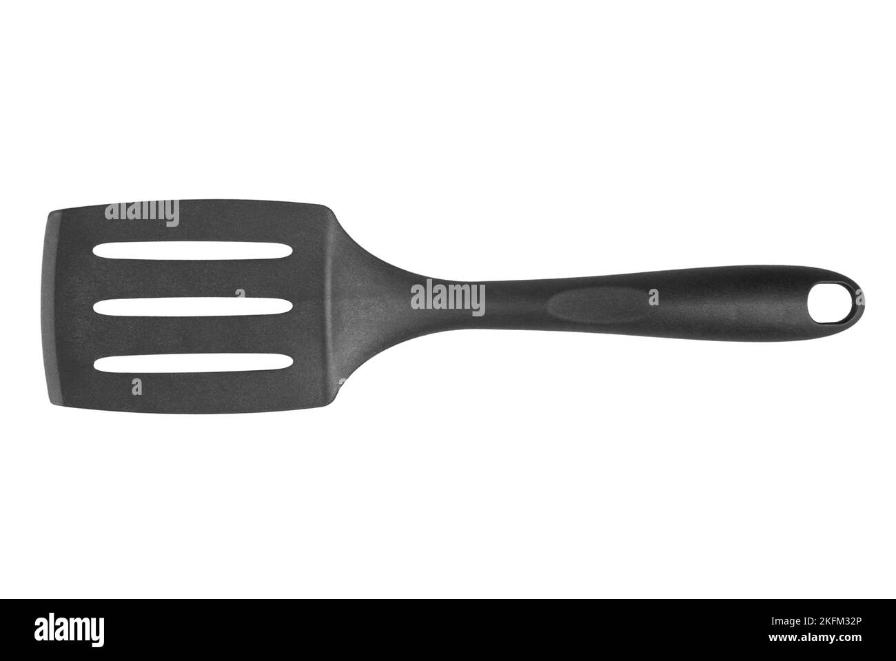 Black plastic cooking spatula isolated on white background. Kitchen