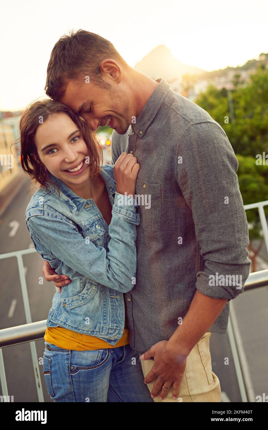 Hes so good to me. a happy young couple enjoying a romantic moment in the city. Stock Photo