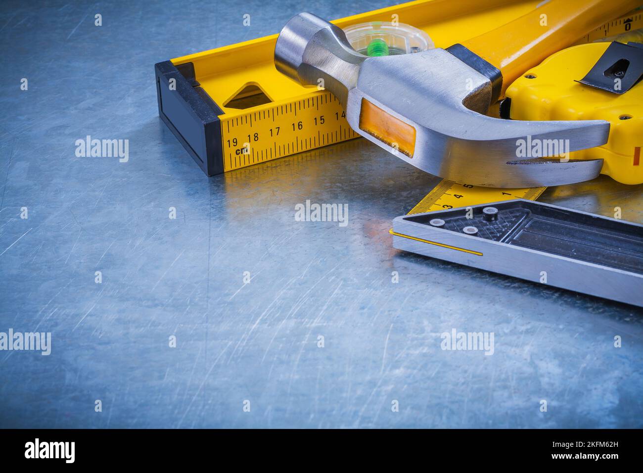 Horizontal version of claw hammer tape measure construction level ...