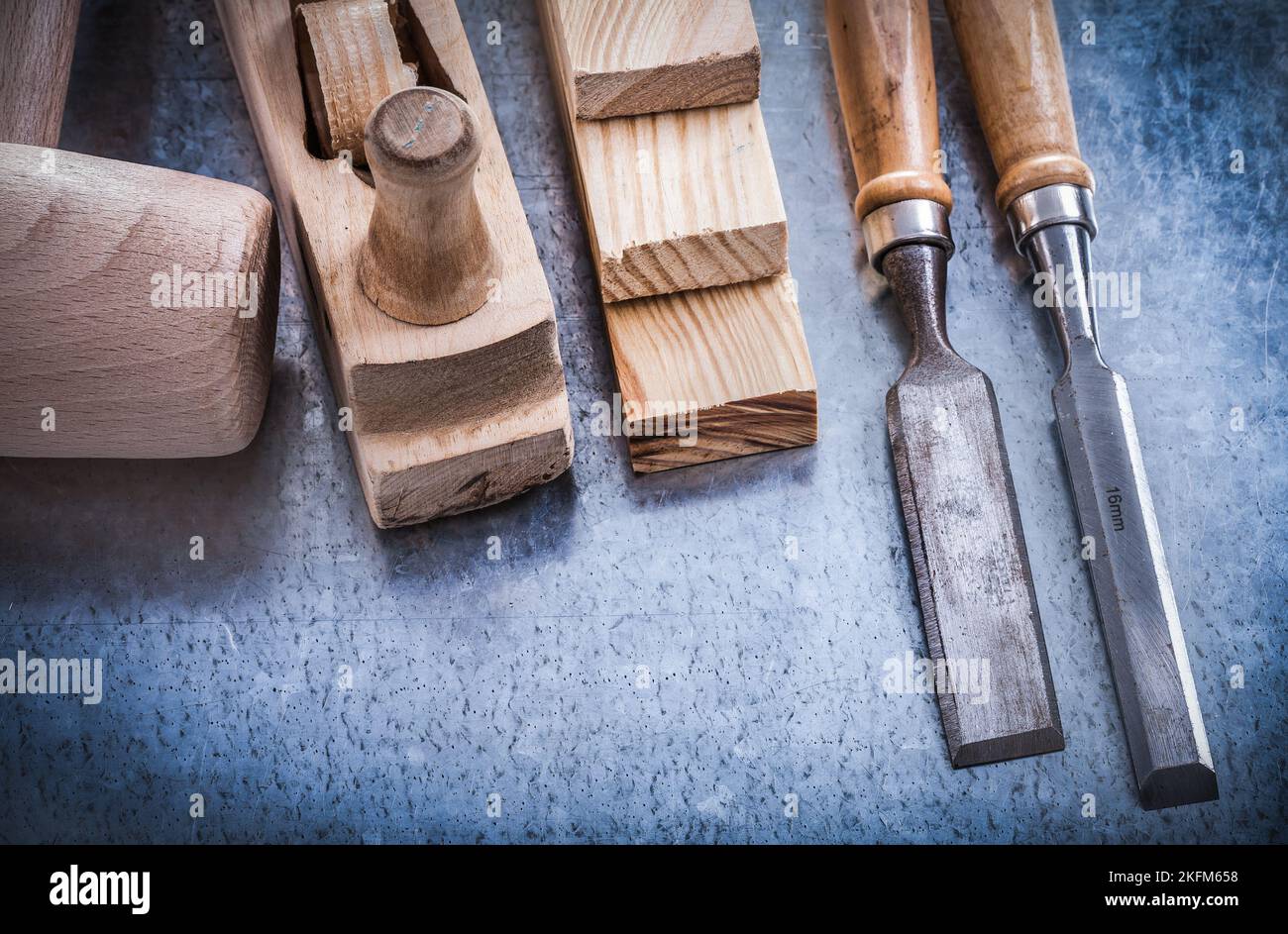 Horizontal version of wooden planer hammer bricks chisels construction ...