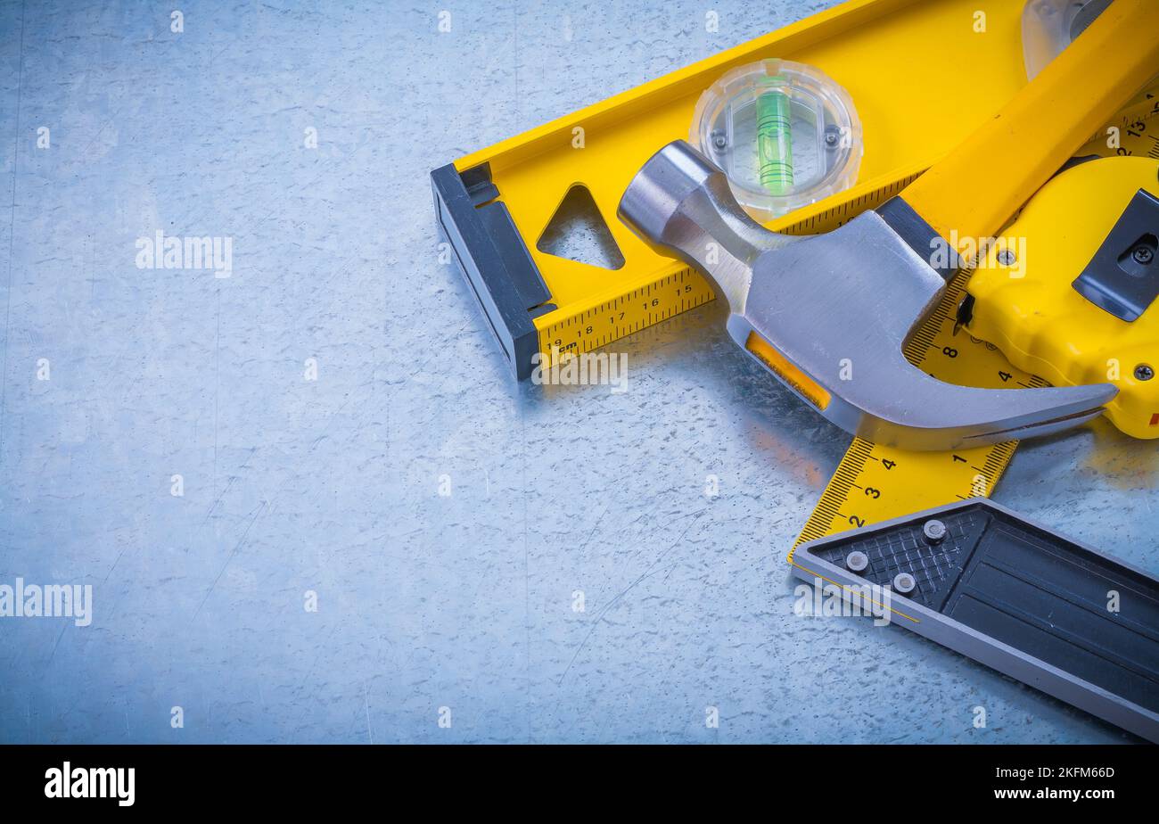 Horizontal view of hammer measuring tape construction level square ...