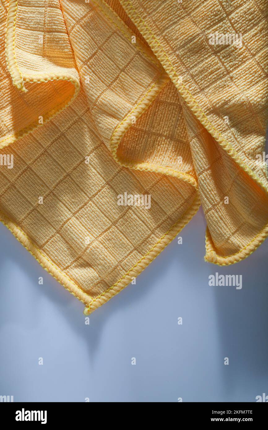 New household dishrags on white background. Stock Photo