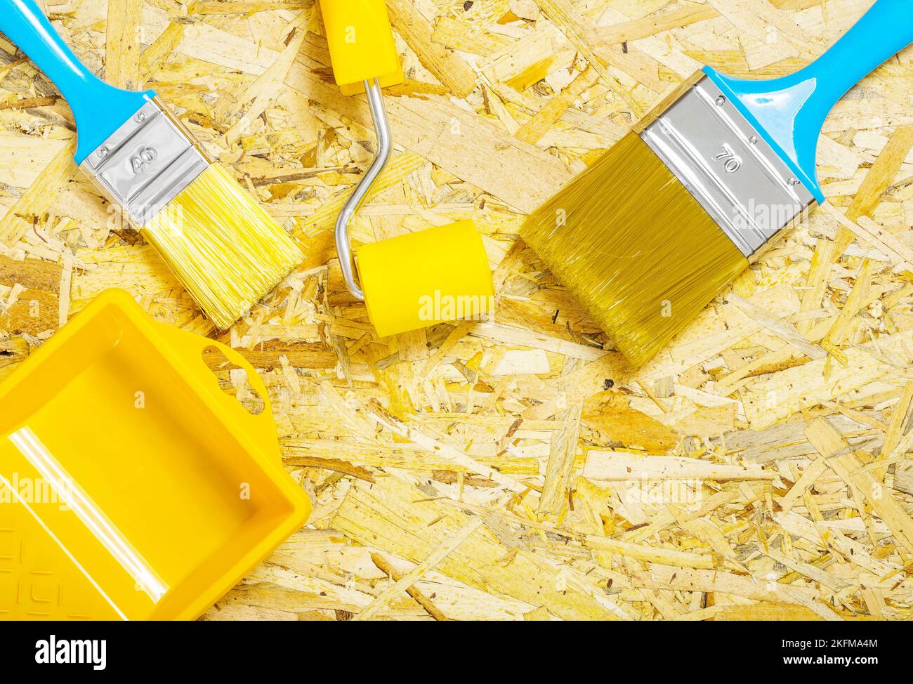 paint tools on plywood Stock Photo Alamy