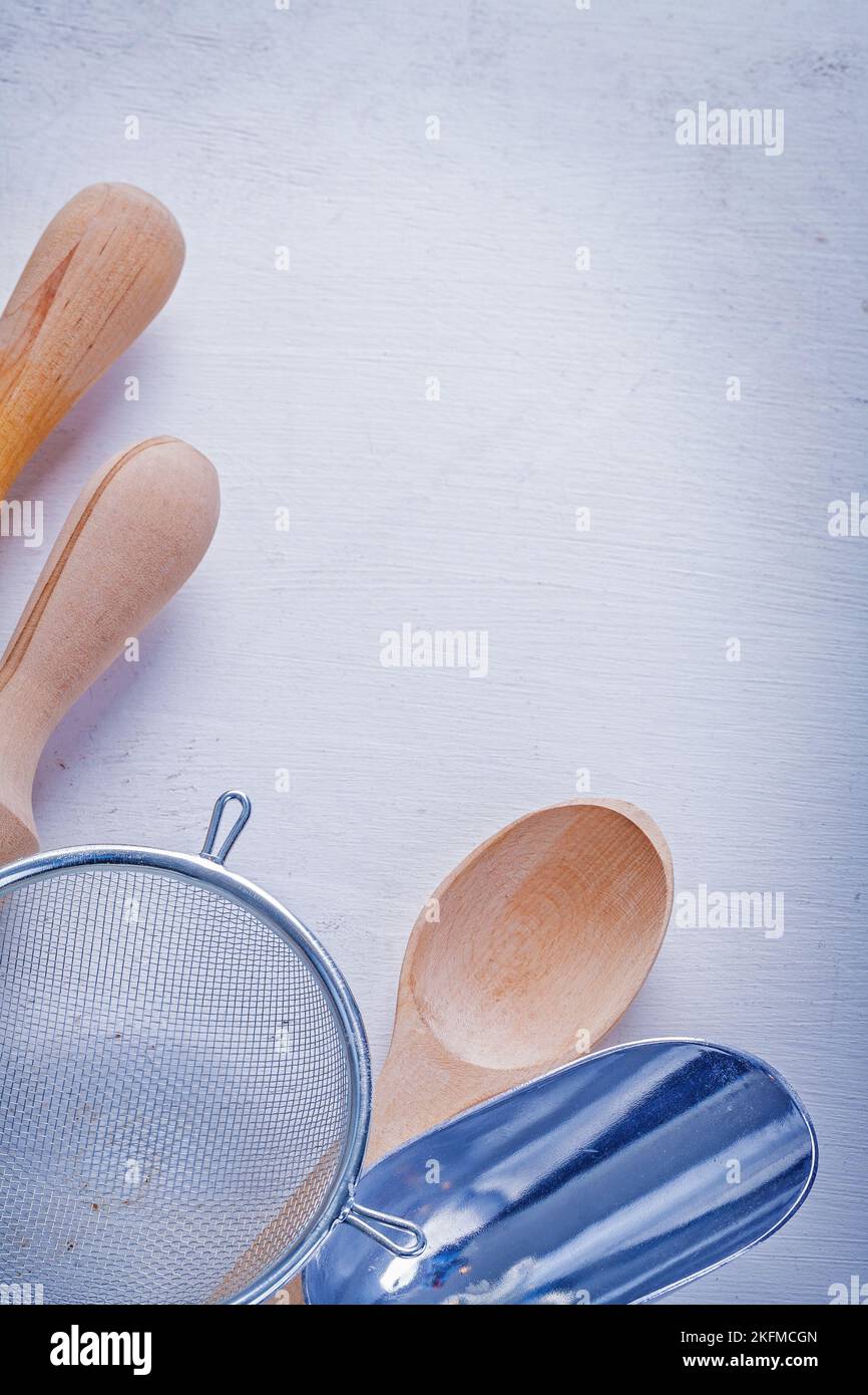 rolling pins sieve spoon scoop on white board Stock Photo Alamy