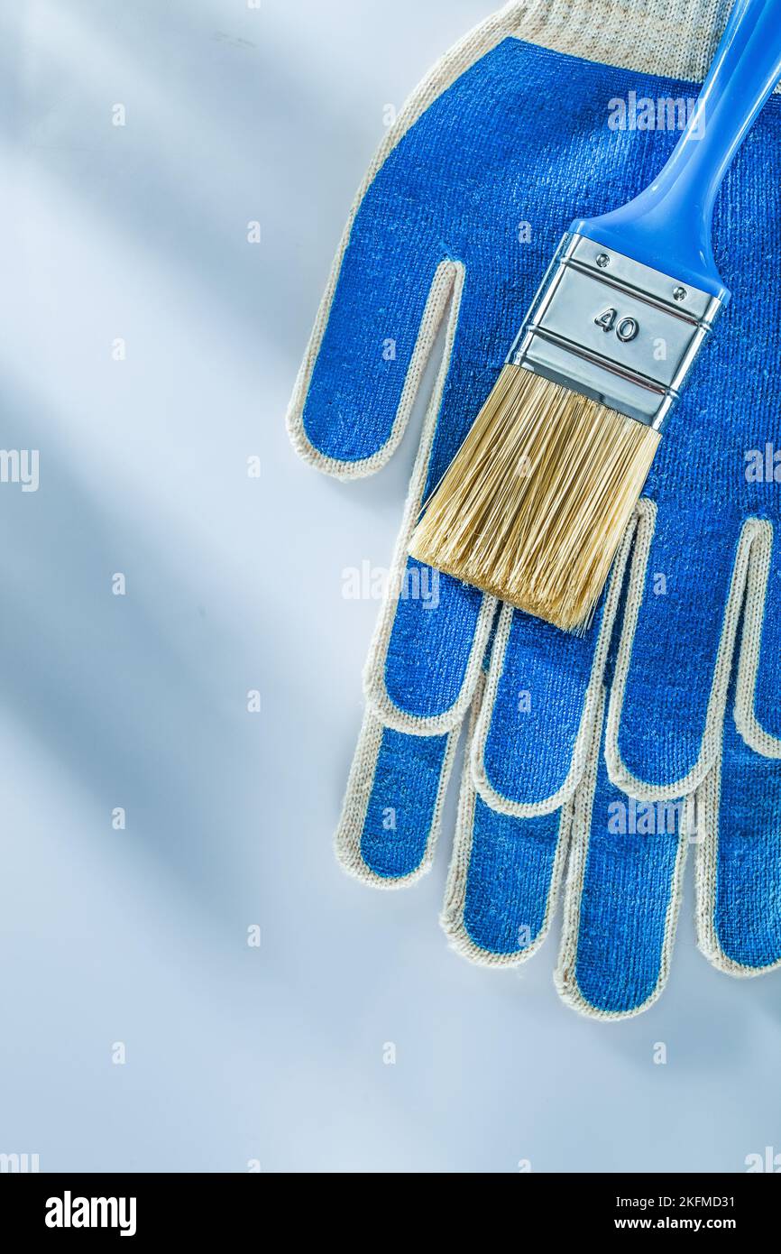 Safety gloves paintbrush on white background Stock Photo Alamy