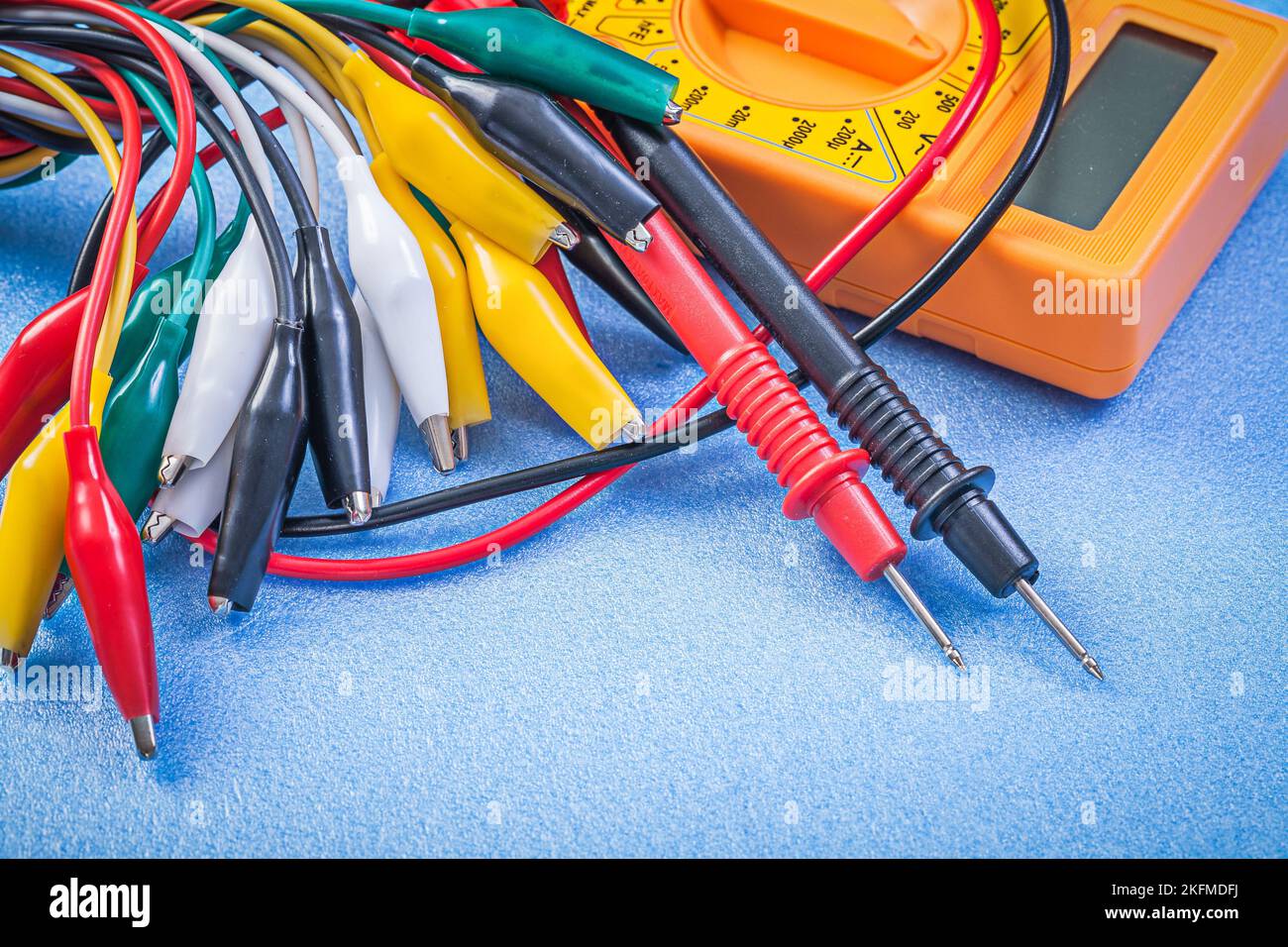 Plug Multimeter Set of crocodile plugs digital multimeter on blue background Stock ...