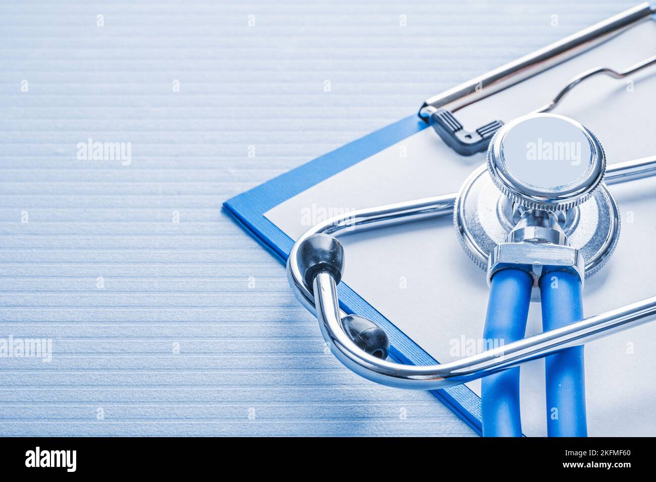 stehoscope and clipboard on blue background medical concept Stock Photo ...