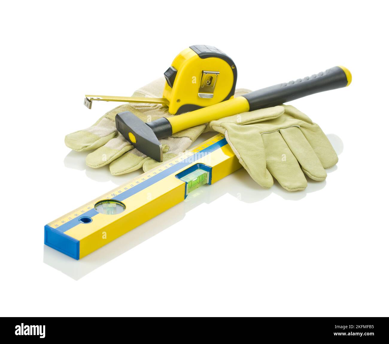 tapeline, level, gloves and hammer Stock Photo