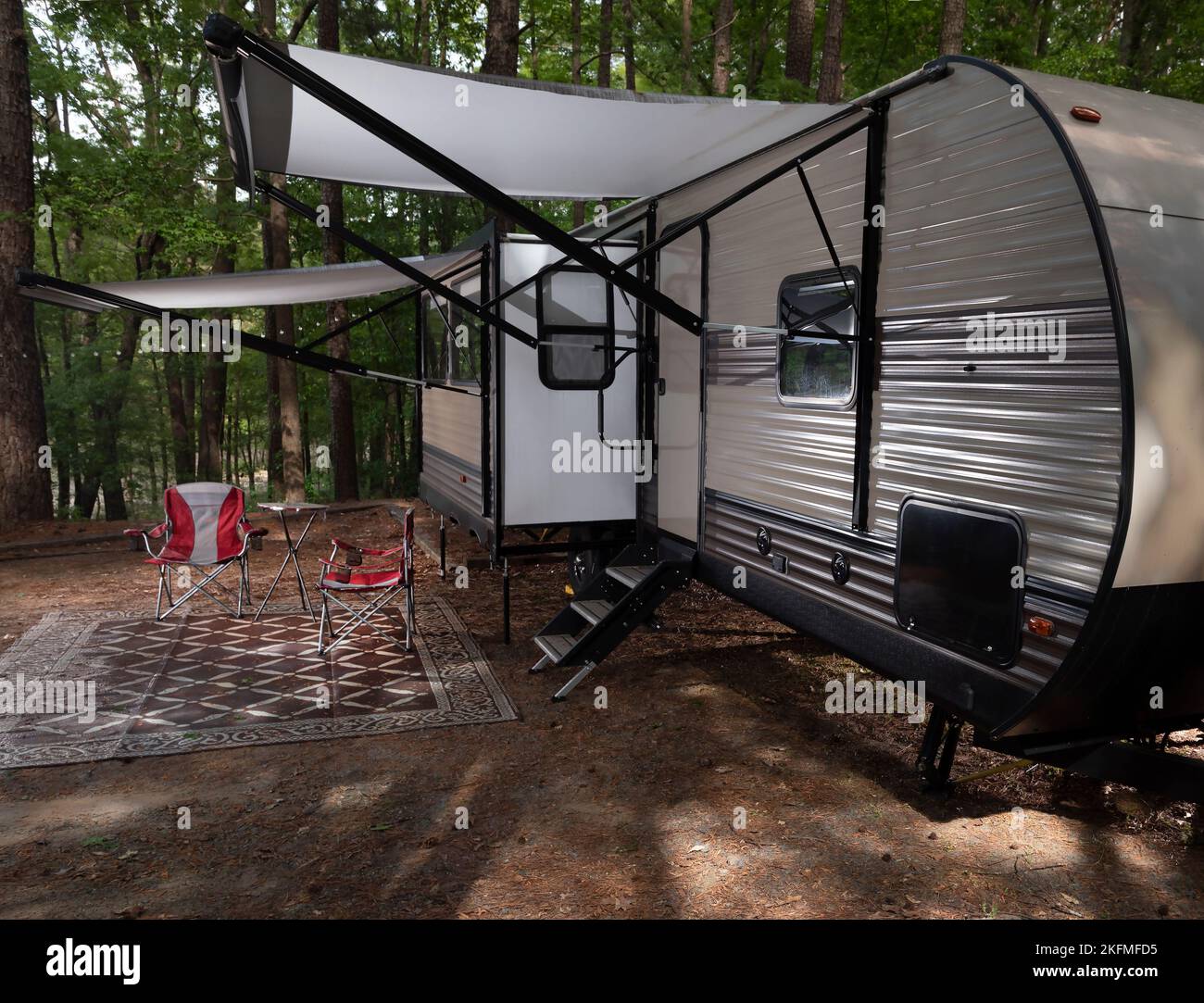 Two awnings out in a camping trailer campsite Stock Photo Alamy