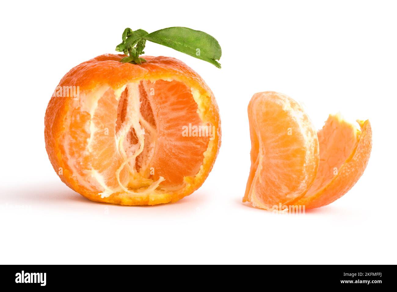 the opened tangerine with leaf isolated Stock Photo