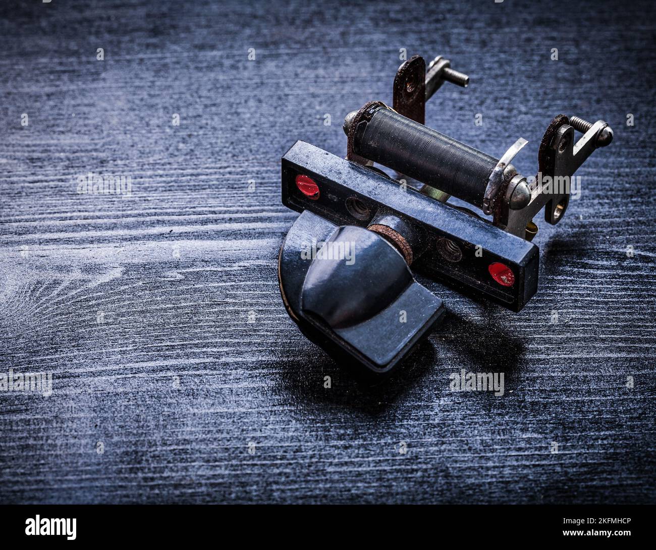 Vintage rheostat on wooden board electricity concept Stock Photo - Alamy