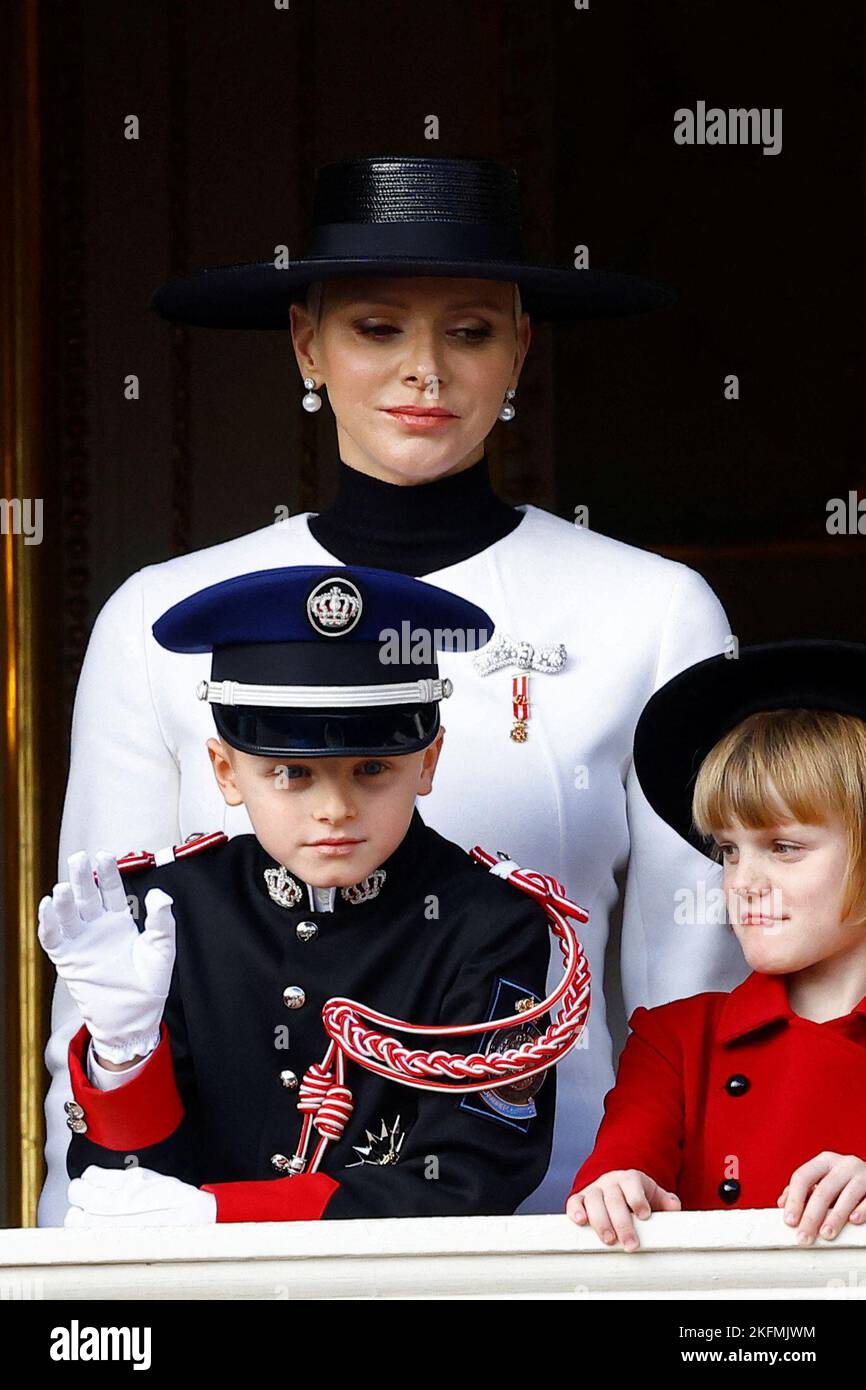 Princess Charlene of Monaco, Prince Jacques and Princess Gabriella stand on the Palace balcony during the celebrations marking Monaco's National Day in Monaco, November 19, 2022. REUTERS/Eric Gaillard Stock Photo