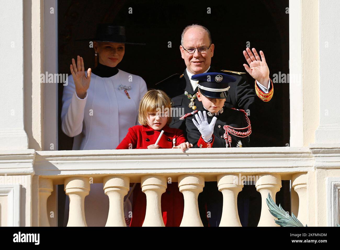 Prince Albert II of Monaco, Princess Charlene, Prince Jacques and Princess Gabriella stand on the Palace balcony during the celebrations marking Monaco's National Day in Monaco, November 19, 2022. REUTERS/Eric Gaillard Stock Photo