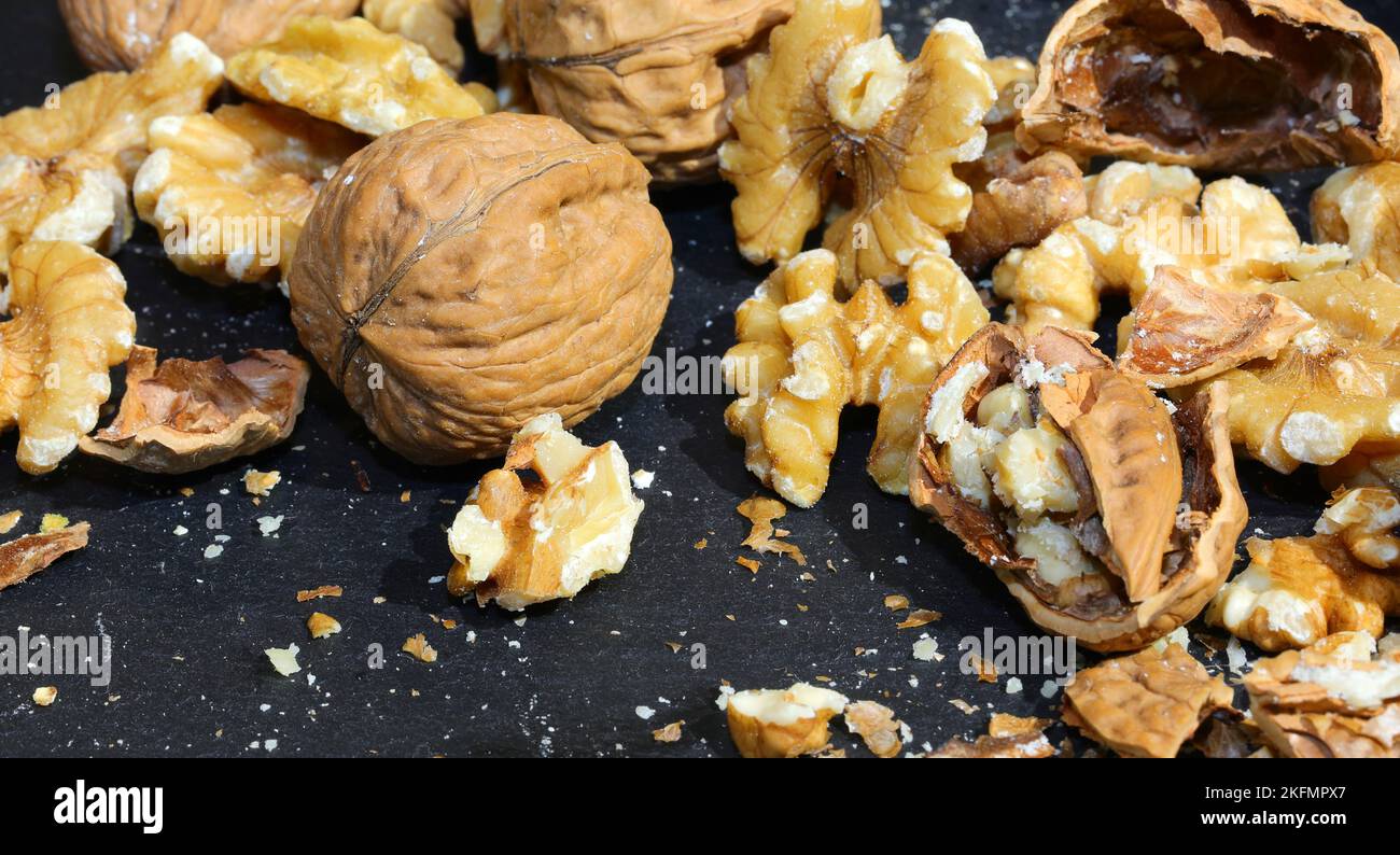 broken shells of walnuts with the edible kernel inside Stock Photo - Alamy