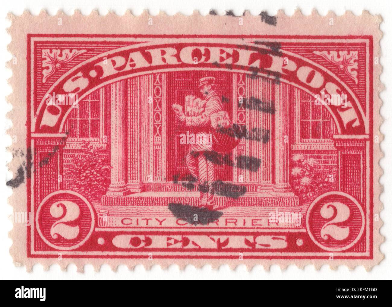 USA - 1913: An 2 cents carmine-rose Parcel Post stamp depicting City Carrier. Issued for the prepayment of postage on parcel post packages only. Parcel post is a postal service for mail that is too heavy for normal letter post. It is usually slower than letter post. The development of the parcel post is closely connected with the development of the railway network which enabled parcels to be carried in bulk, to a regular schedule and at economic prices. Today, many parcels also travel by road and international shipments may travel by sea or airmail Stock Photo