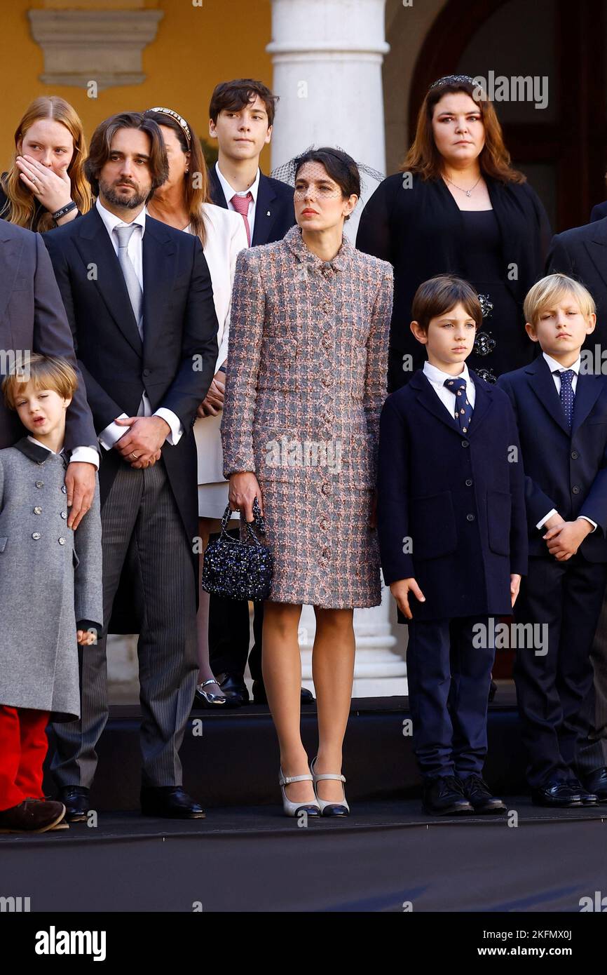 Charlotte Casiraghi and her husband Dimitri Rassam, and Raphael Elmaleh attend celebrations marking Monaco's National Day at the Palace in Monaco, November 19, 2022. REUTERS/Eric Gaillard/Pool Stock Photo