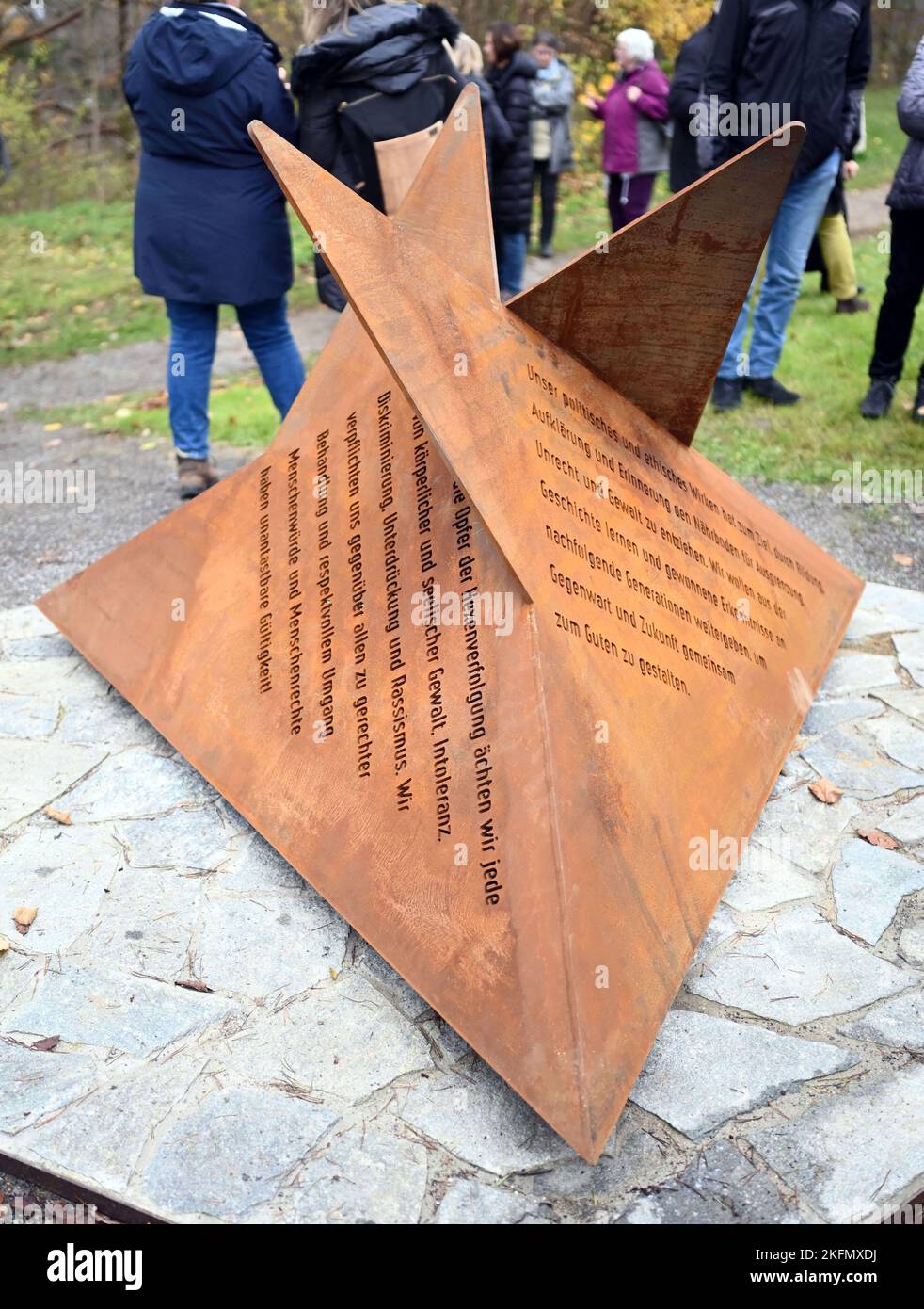 Horb Am Neckar, Germany. 19th Nov, 2022. On the gallows field, a memorial commemorating the victims of the witch hunt is handed over to the public. Where once at the Horber gallows the alleged witches were publicly beheaded and their bodies burned at the stake, visible from afar, now stands on a hexagonal foundation a three-sided arrowhead pyramid made of Corten steel. The memorial was designed by Horber's cultural commissioner A. Maier. Credit: Uli Deck/dpa/Alamy Live News Stock Photo