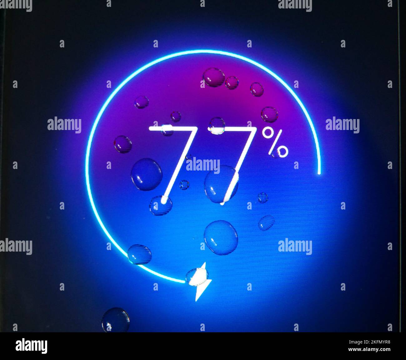 smartphone battery indicator screen with waterdrops Stock Photo Alamy