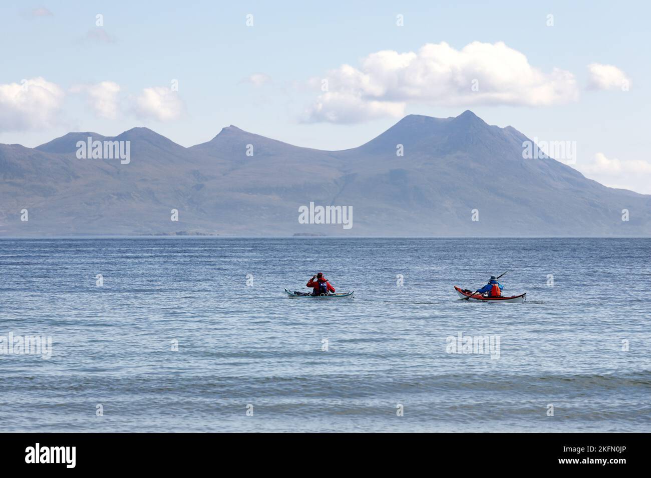 Two People Paddling a Sea Kayaks of the Coast near Mellon Udrigle, Wester Ross, Scotland, UK Stock Photo