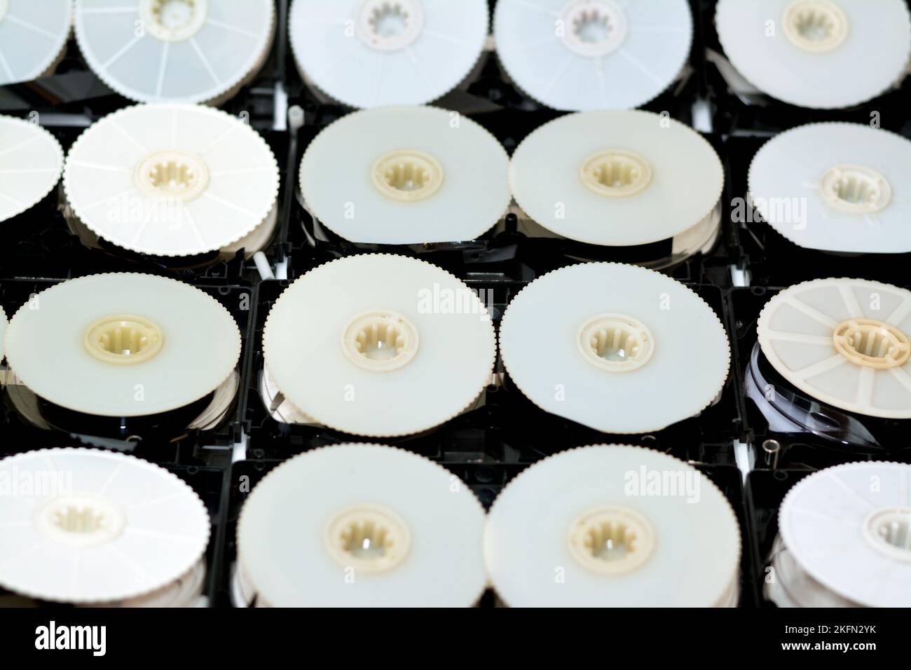 Pile of VHS video cassette tape from inside with the front casing