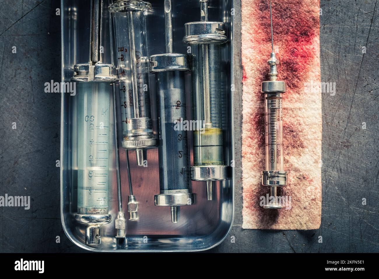 Dirty and old needle and syringes preparation for vaccination. Old