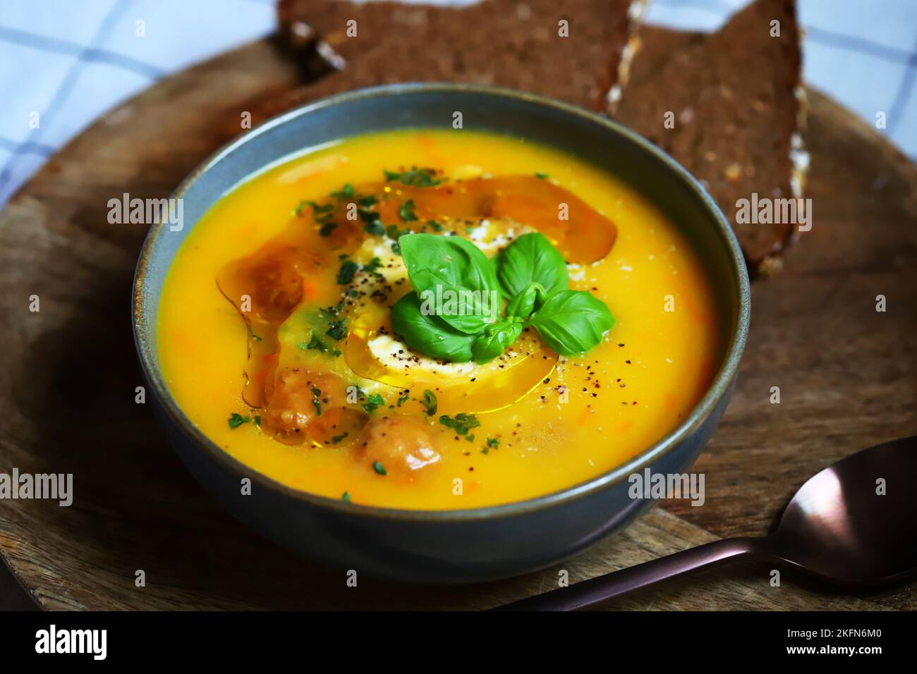 Pumpkin carrot soup with meatballs in a bowl. Autumn menu. Stock Photo