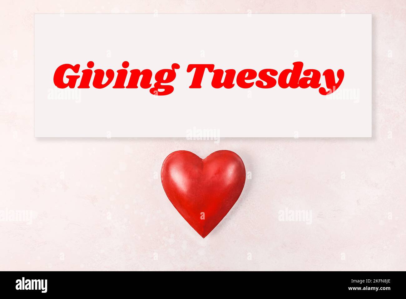 Giving Tuesday is a global day of charitable giving after Black Friday shopping day. Charity, give help, donations and support concept with text messa Stock Photo