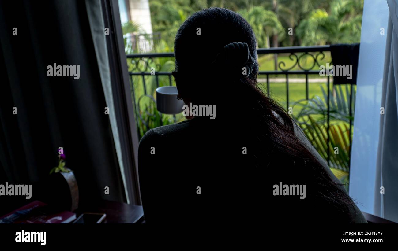 Muslim women having tea at the balcony in the morning Stock Photo