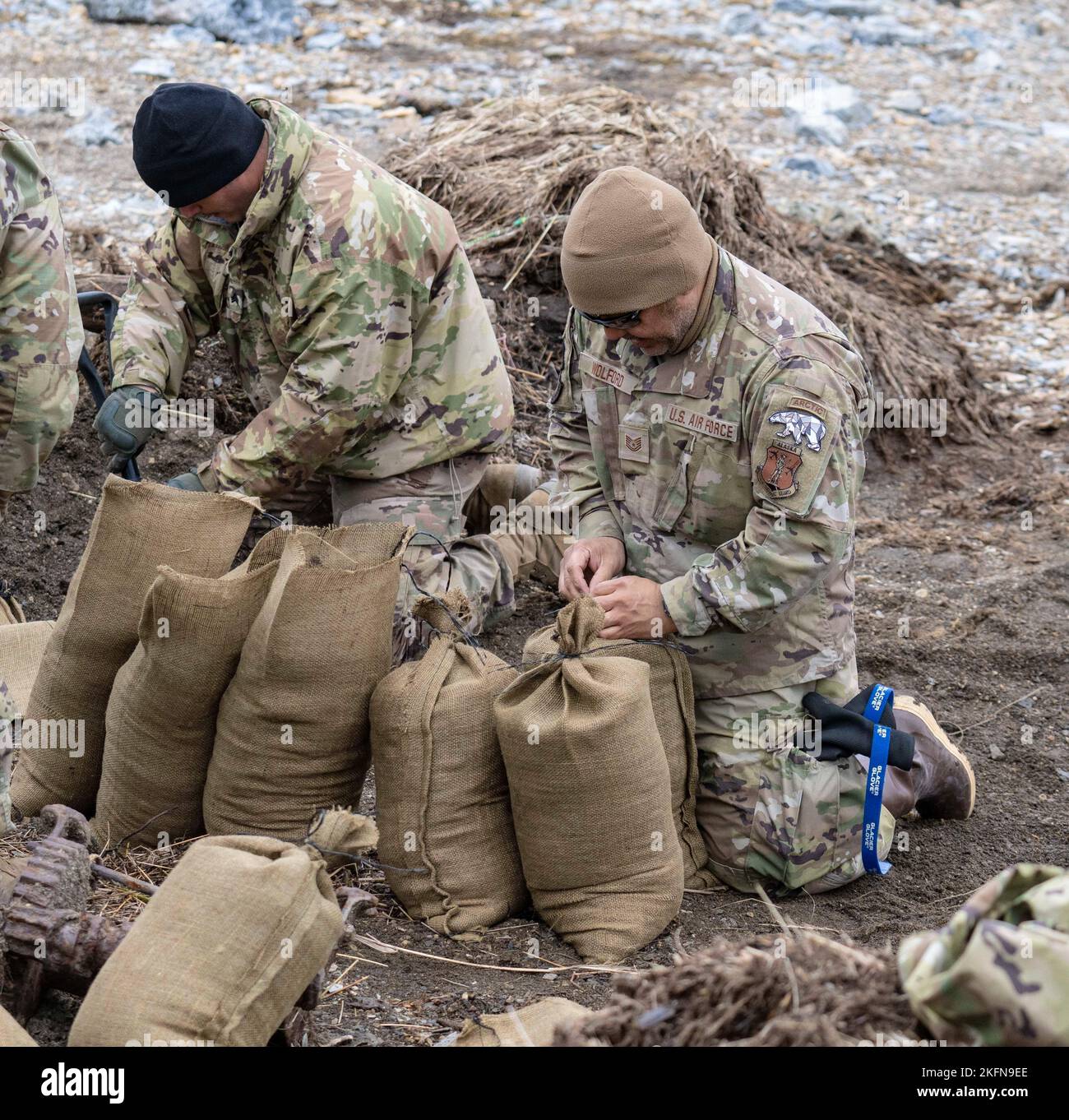 Alaska Air National Guard Tech. Sgt. Robert Wolford (right), a metals